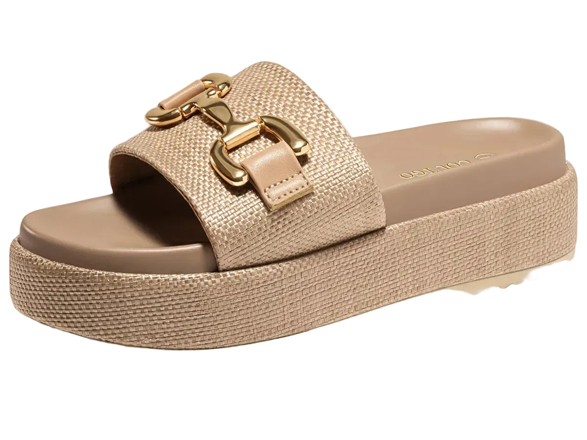 A single platform slide sandal in beige with a woven-texture strap, a gold-tone horsebit buckle detail, and a thick wavy sole, shown on a white background.